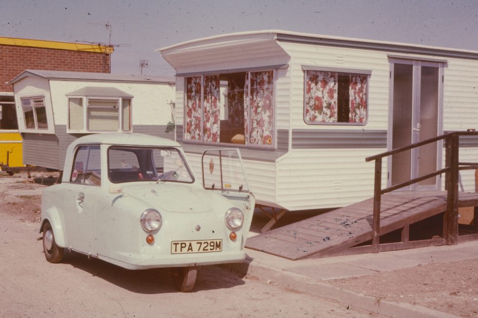 vintage mobile home and car