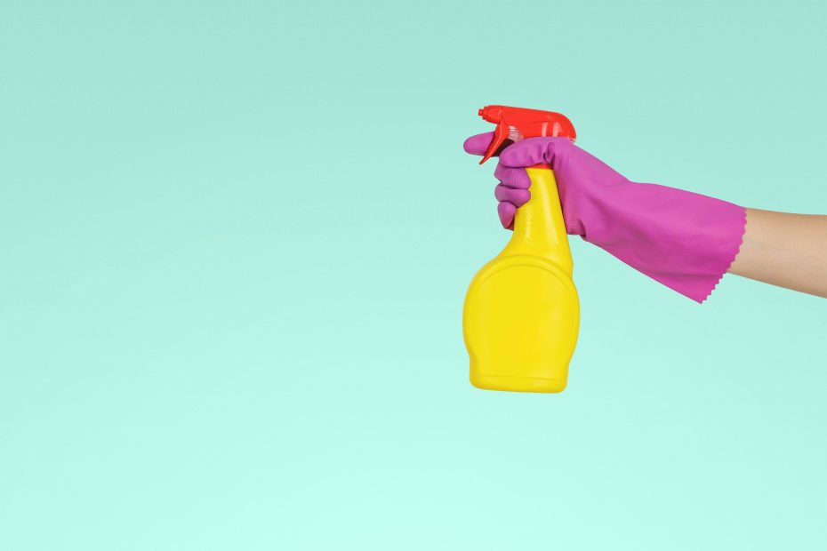 cleaning spray bottle and glove